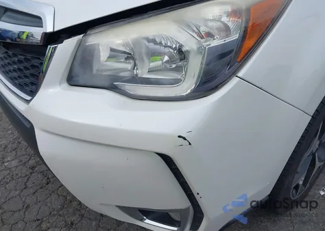 2014 Subaru Forester 2.0Xt Touring z USA, uszkodzony, nr VIN JF2SJGPC2EH488523